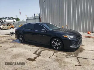 2018 Toyota Camry LE с VIN 4T1B11HKXJU656262, выставлен на аукционе Copart как лот 57132965 с пробегом 106 876 миль миль и Списание • Salvage title. История ставок и продаж доступна на DreamBid. Изображение 13.