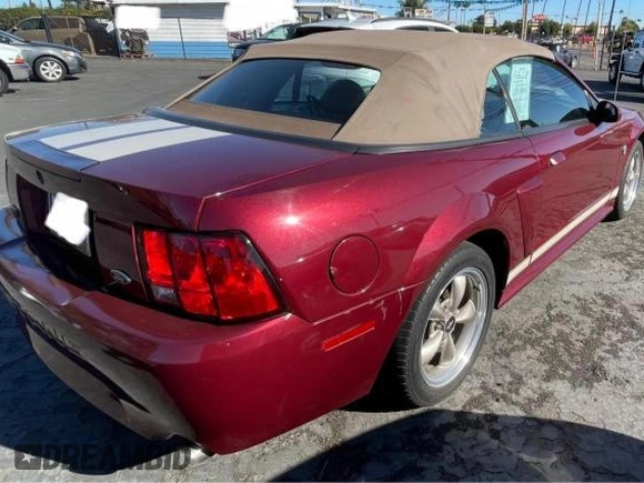 2004 Ford Mustang GT Deluxe z VIN 1FAFP45XX4F150757, wystawiony jako Copart lot #51550375 z przebiegiem 43 827 mil mil oraz Tytuł czysty. Historia ofert i sprzedaży dostępna na DreamBid. Obrazek 4.