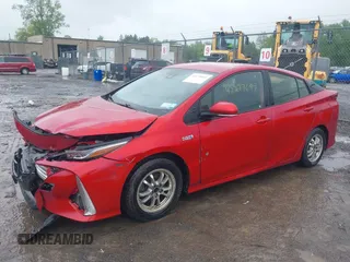 2021 Toyota Prius LE with VIN JTDKAMFP7M3178008, listed as a IAAI auction lot 42273697 with 110,605 mi miles and . Bid and sale history available at DreamBid. Image 17.