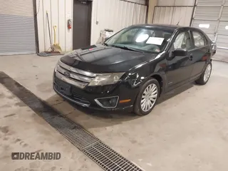 2010 Ford Fusion Hybrid with VIN 3FADP0L39AR140087, listed as a IAAI auction lot 41737705 with 118,563 mi miles. Bid and sale history available at carsss.com. Image 2.