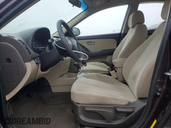 2009 Hyundai Elantra SE z VIN KMHDU46D89U784842, wystawiony jako Copart lot #61274075 z przebiegiem 182 433 mil mil oraz Szkoda całkowita • Salvage title. Historia ofert i sprzedaży dostępna na DreamBid. Obrazek 7.