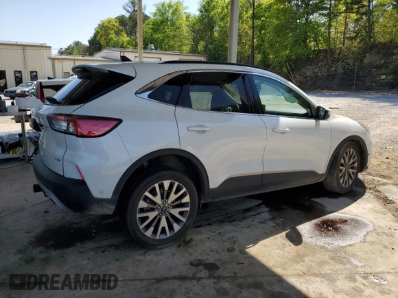 2020 Ford Escape Titanium с VIN 1FMCU9J93LUB38014, выставлен на аукционе Copart как лот 52348725 с пробегом 78 193 миль миль и Списание • Salvage title. История ставок и продаж доступна на DreamBid. Изображение 3.