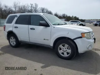 2010 Ford Escape Hybrid z VIN 1FMCU5K30AKC13098, wystawiony jako Copart lot #53623855 z przebiegiem 206 975 mil mil oraz Szkoda całkowita • Salvage title. Historia ofert i sprzedaży dostępna na DreamBid. Obrazek 4.