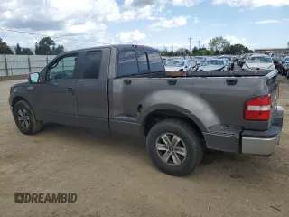 2005 Ford F-150 XLT with VIN 1FTPX02555KB64679, listed as a Copart auction lot 51839015 with 227,569 mi miles and Salvage Title. Bid and sale history available at carsss.com. Image 2.