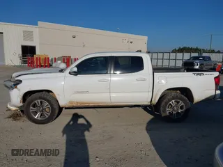 2018 Toyota Tacoma SR5 with VIN 3TMAZ5CN4JM062272, listed as a IAAI auction lot 41671472 with 114,566 mi miles and . Bid and sale history available at DreamBid. Image 15.