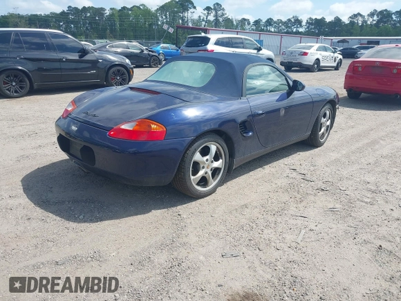 2002 Porsche Boxster with VIN WP0CA29812U622973, listed as a IAAI auction lot 42104707 with 56,744 mi miles and . Bid and sale history available at DreamBid. Image 4.