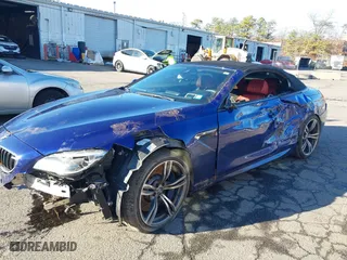 2018 BMW M6 with VIN WBS6G9C56JBM23844, listed as a IAAI auction lot 41206052 with 32,670 mi miles. Bid and sale history available at carsss.com. Image 6.