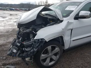2015 Jeep Grand Cherokee Limited with VIN 1C4RJFBG3FC671803, listed as a IAAI auction lot 41224584 with 110,589 mi miles. Bid and sale history available at carsss.com. Image 16.
