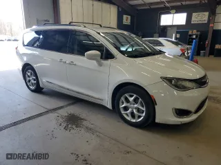 2019 Chrysler Pacifica Touring L with VIN 2C4RC1BGXKR666001, listed as a Copart auction lot 54199865 with 243,592 mi miles and Clean Title. Bid and sale history available at carsss.com. Image 4.