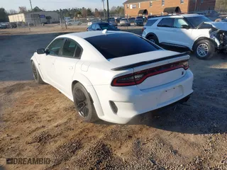 2020 Dodge Charger Scat Pack with VIN 2C3CDXGJ1LH217683, listed as a IAAI auction lot 41656722 with 70,758 mi miles. Bid and sale history available at carsss.com. Image 3.