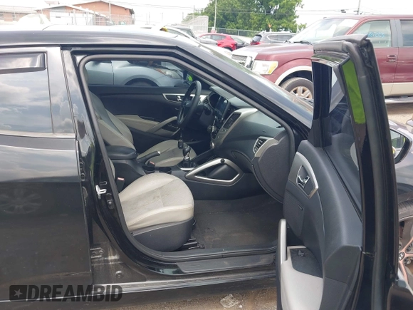 2013 Hyundai Veloster w/Black Int с VIN KMHTC6ADXDU084704, выставлен на аукционе IAAI как лот 42443297 с пробегом 111 587 миль миль и . История ставок и продаж доступна на DreamBid. Изображение 5.