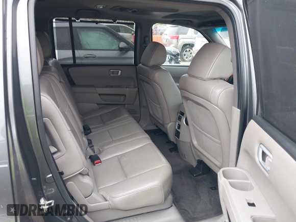2012 Honda Pilot Touring with VIN 5FNYF4H98CB065003, listed as a IAAI auction lot 41989829 with 91,607 mi miles and . Bid and sale history available at DreamBid. Image 8.