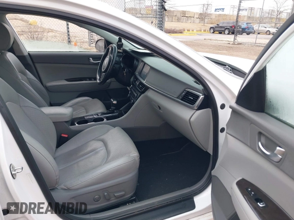 2016 Kia Optima EX with VIN 5XXGU4L31GG027250, listed as a IAAI auction lot 41881343 with 135,635 mi miles. Bid and sale history available at carsss.com. Image 5.