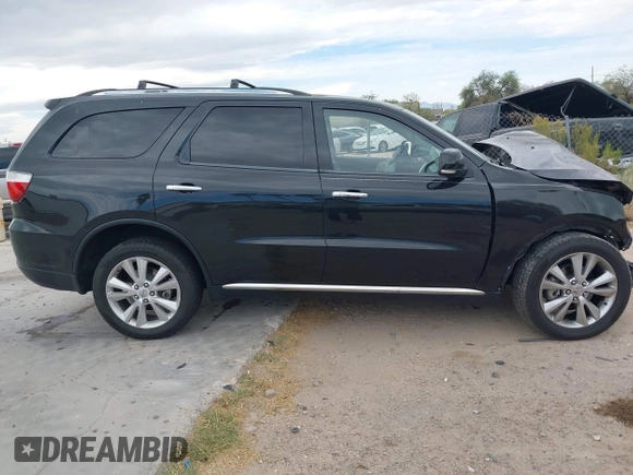 2013 Dodge Durango Crew with VIN 1C4RDHDG1DC647447, listed as a IAAI auction lot 42237714 with 177,523 mi miles and . Bid and sale history available at DreamBid. Image 13.