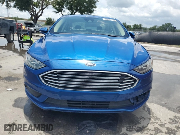 2017 Ford Fusion Hybrid SE z VIN 3FA6P0LU6HR319103, wystawiony jako Copart lot #58494695 z przebiegiem 104 483 mil mil oraz Szkoda całkowita • Salvage title. Historia ofert i sprzedaży dostępna na DreamBid. Obrazek 5.
