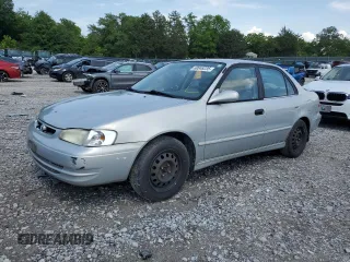 2000 Toyota Corolla VE with VIN 2T1BR12E7YC315182, listed as a Copart auction lot 60048235 with 230,094 mi miles and Salvage title. Bid and sale history available at DreamBid. Image 1.