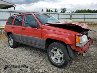 1997 Jeep Grand Cherokee Laredo with VIN 1J4GZ58S3VC739922, listed as a Copart auction lot 55667885 with 209,075 mi miles and Salvage title. Bid and sale history available at DreamBid. Image 4.