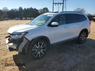 2022 Honda Pilot Touring 7-Passenger with VIN 5FNYF6H66NB059642, listed as a Copart auction lot 87802435 with 26,039 mi miles and Salvage Title. Bid and sale history available at carsss.com. Image 1.