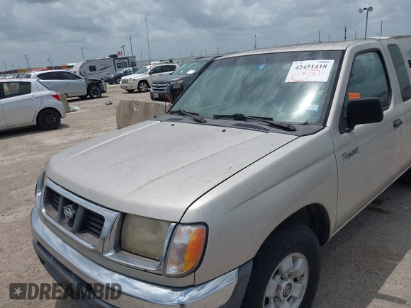 1999 Nissan Frontier XE with VIN 1N6DD26S0XC317003, listed as a IAAI auction lot 42451418 with 246,667 mi miles and . Bid and sale history available at DreamBid. Image 6.