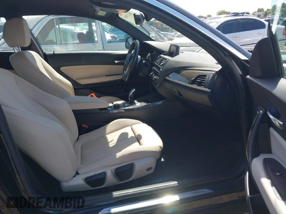 2016 BMW 2 Series 228i with VIN WBA1F9C5XGV545664, listed as a IAAI auction lot 39327505 with 94,583 mi miles. Bid and sale history available at carsss.com. Image 5.