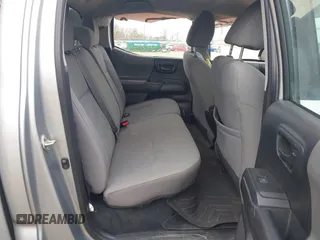 2018 Toyota Tacoma SR with VIN 3TMCZ5AN4JM130307, listed as a IAAI auction lot 41541477 with 74,369 mi miles and . Bid and sale history available at DreamBid. Image 8.