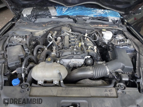 2021 Ford Mustang EcoBoost z VIN 1FA6P8TH4M5126706, wystawiony jako IAAI lot #42465164 z przebiegiem 49 795 mil mil oraz . Historia ofert i sprzedaży dostępna na DreamBid. Obrazek 10.