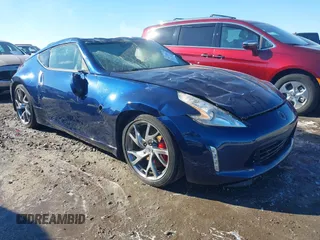 2014 Nissan 370Z Nismo with VIN JN1AZ4EH9EM635608, listed as a IAAI auction lot 41333034 with 45,354 mi miles and . Bid and sale history available at DreamBid. Image 1.