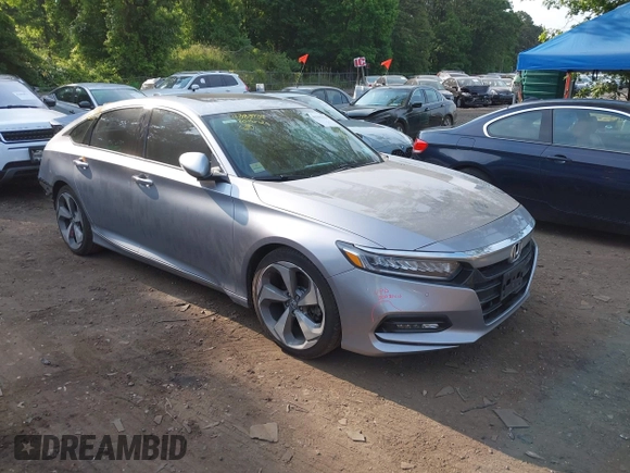 2020 Honda Accord Touring z VIN 1HGCV2F93LA017701, wystawiony jako IAAI lot #42383938 z przebiegiem 40 945 mil mil oraz . Historia ofert i sprzedaży dostępna na DreamBid. Obrazek 1.
