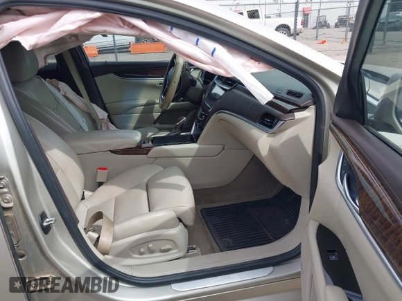2013 Cadillac XTS Luxury with VIN 2G61P5S30D9132193, listed as a IAAI auction lot 41897709 with 140,780 mi miles and . Bid and sale history available at DreamBid. Image 5.