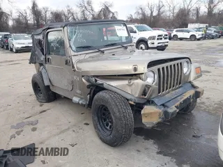 2003 Jeep Wrangler X with VIN 1J4FA39SX3P329386, listed as a IAAI auction lot 41407594 with 140,390 mi miles. Bid and sale history available at carsss.com. Image 1.
