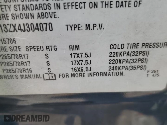 2004 Chevrolet Tahoe LT with VIN 1GNEC13ZX4J304070, listed as a Copart auction lot 59779655 with 123,241 mi miles and Salvage title. Bid and sale history available at DreamBid. Image 13.