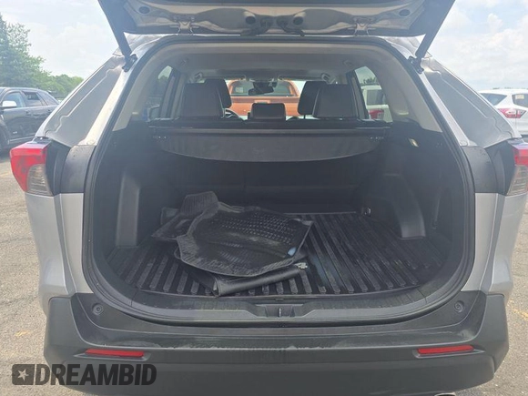 2022 Toyota RAV4 Hybrid XLE Premium with VIN 4T3B6RFV2NU084419, listed as a IAAI auction lot 42729518 with 76,607 mi miles and . Bid and sale history available at DreamBid. Image 17.