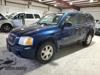 2004 GMC Envoy SLE with VIN 1GKDT13S942302025, listed as a Copart auction lot 84174174 with 198,831 mi miles and Salvage Title. Bid and sale history available at carsss.com. Image 1.