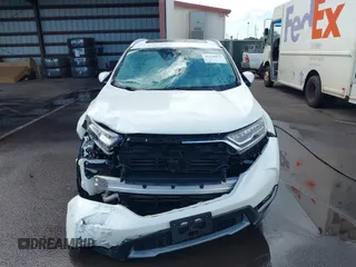 2018 Honda CR-V Touring with VIN 2HKRW1H96JH506435, listed as a IAAI auction lot 41228873 with 11,585 mi miles and . Bid and sale history available at DreamBid. Image 13.