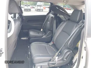 2023 Honda Odyssey Touring with VIN 5FNRL6H88PB079716, listed as a IAAI auction lot 42208628 with 26,679 mi miles and . Bid and sale history available at DreamBid. Image 8.