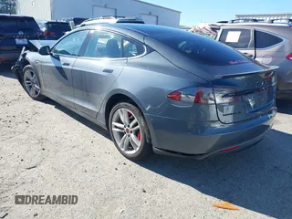 2013 Tesla Model S Performance with VIN 5YJSA1DP7DFP11737, listed as a IAAI auction lot 40915195 with Not provided miles and . Bid and sale history available at DreamBid. Image 3.