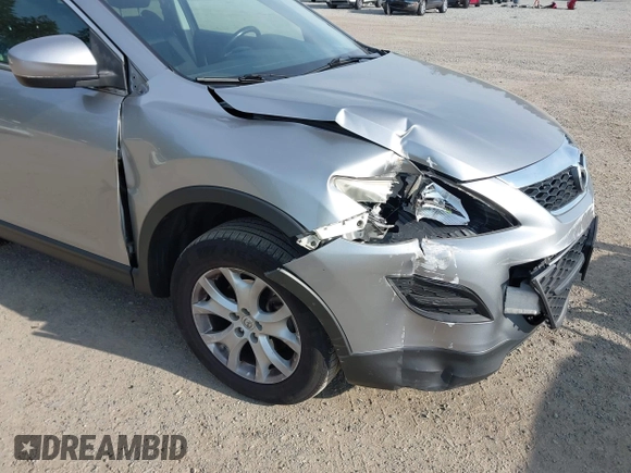 2012 Mazda CX-9 Sport z VIN JM3TB3BA9C0348888, wystawiony jako IAAI lot #42520255 z przebiegiem 138 012 mil mil oraz . Historia ofert i sprzedaży dostępna na DreamBid. Obrazek 6.