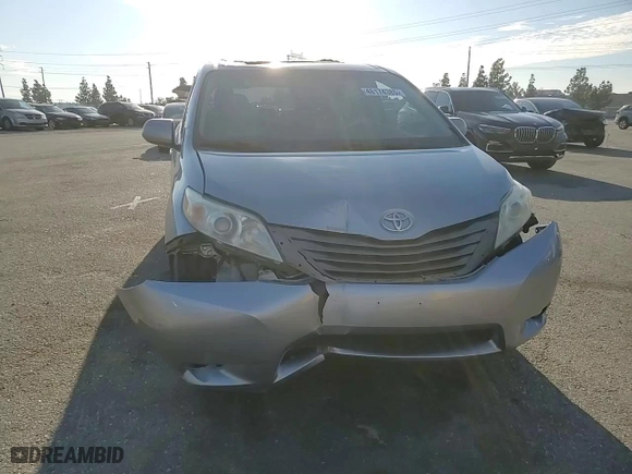 2014 Toyota Sienna XLE with VIN 5TDYK3DC8ES472826, listed as a Copart auction lot 46174385 with 129,094 mi miles and Salvage Title. Bid and sale history available at carsss.com. Image 11.