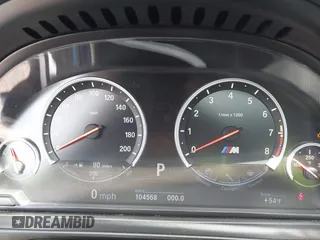 2013 BMW M5 with VIN WBSFV9C56DC772961, listed as a IAAI auction lot 41765457 with 104,568 mi miles. Bid and sale history available at carsss.com. Image 7.