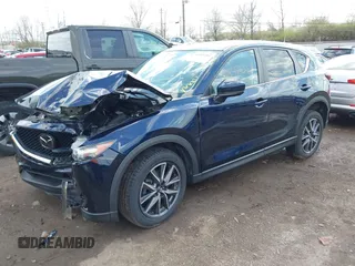2018 Mazda CX-5 Touring with VIN JM3KFBCM5J0369799, listed as a IAAI auction lot 41895364 with 76,801 mi miles and . Bid and sale history available at carsss.com. Image 2.