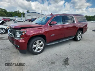 2016 Chevrolet Suburban LT with VIN 1GNSKHKC2GR171063, listed as a Copart auction lot 59477495 with 107,264 mi miles and Salvage title. Bid and sale history available at DreamBid. Image 1.