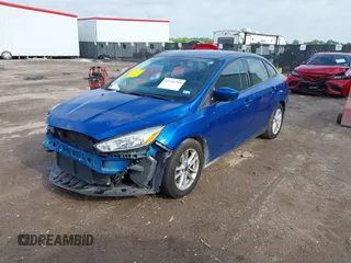 2018 Ford Focus SE z VIN 1FADP3F2XJL293337, wystawiony jako IAAI lot #42121294 z przebiegiem 71 241 mil mil oraz . Historia ofert i sprzedaży dostępna na DreamBid. Obrazek 17.