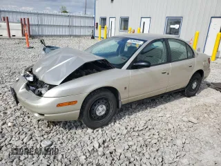 2001 Saturn SL z VIN 1G8ZK52741Z200069, wystawiony jako Copart lot #56360685 z przebiegiem 115 673 mil mil oraz Nie do naprawy. Historia ofert i sprzedaży dostępna na DreamBid. Obrazek 1.