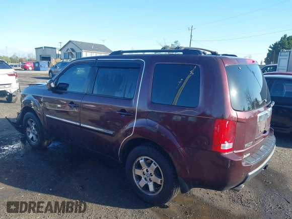 2011 Honda Pilot Touring z VIN 5FNYF4H9XBB040893, wystawiony jako IAAI lot #41933530 z przebiegiem 161 725 mil mil oraz . Historia ofert i sprzedaży dostępna na DreamBid. Obrazek 3.