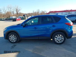 2013 Mazda CX-5 Touring z VIN JM3KE4CE7D0119119, wystawiony jako IAAI lot #41802331 z przebiegiem 204 417 mil mil oraz . Historia ofert i sprzedaży dostępna na DreamBid. Obrazek 14.