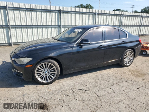 2012 BMW 3 Series 328i with VIN WBA3A5C58CF348710, listed as a Copart auction lot 61266815 with 112,720 mi miles and Salvage title. Bid and sale history available at DreamBid. Image 1.