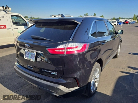 2020 Ford Edge Titanium with VIN 2FMPK3K99LBA73839, listed as a IAAI auction lot 42843885 with 92,381 mi miles and . Bid and sale history available at DreamBid. Image 23.