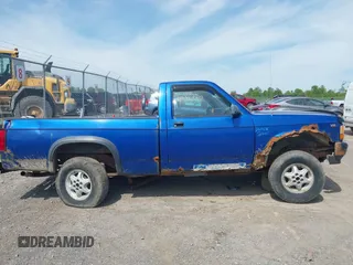 1994 Dodge Dakota z VIN 1B7GG26X5RW145863, wystawiony jako IAAI lot #42345217 z przebiegiem 117 441 mil mil oraz . Historia ofert i sprzedaży dostępna na DreamBid. Obrazek 14.