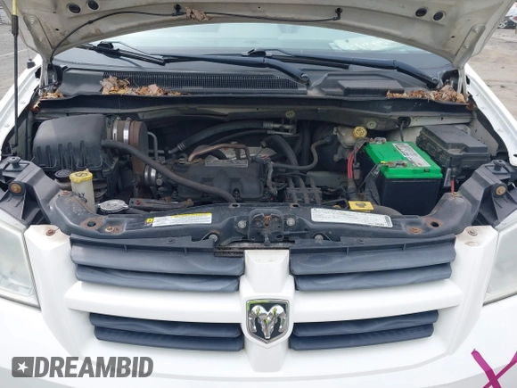 2010 Dodge Grand Caravan SE with VIN 2D4RN4DE0AR296590, listed as a IAAI auction lot 42133404 with 108,604 mi miles and . Bid and sale history available at DreamBid. Image 10.