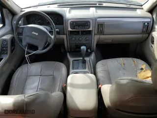 2004 Jeep Grand Cherokee Laredo with VIN 1J4GX48N54C333603, listed as a Copart auction lot 42620514 with 172,410 mi miles and Non Repairable. Bid and sale history available at carsss.com. Image 8.